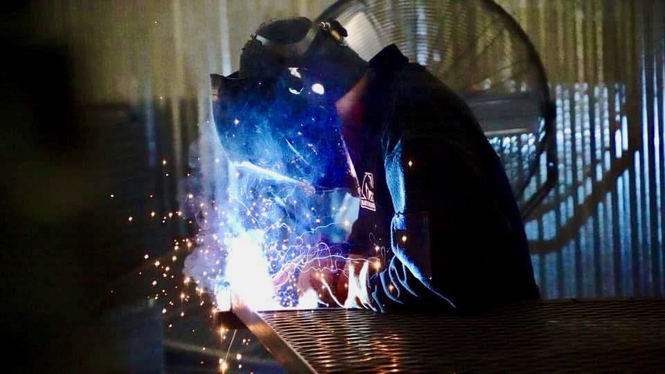 Welding Window Well Covers by John Henry